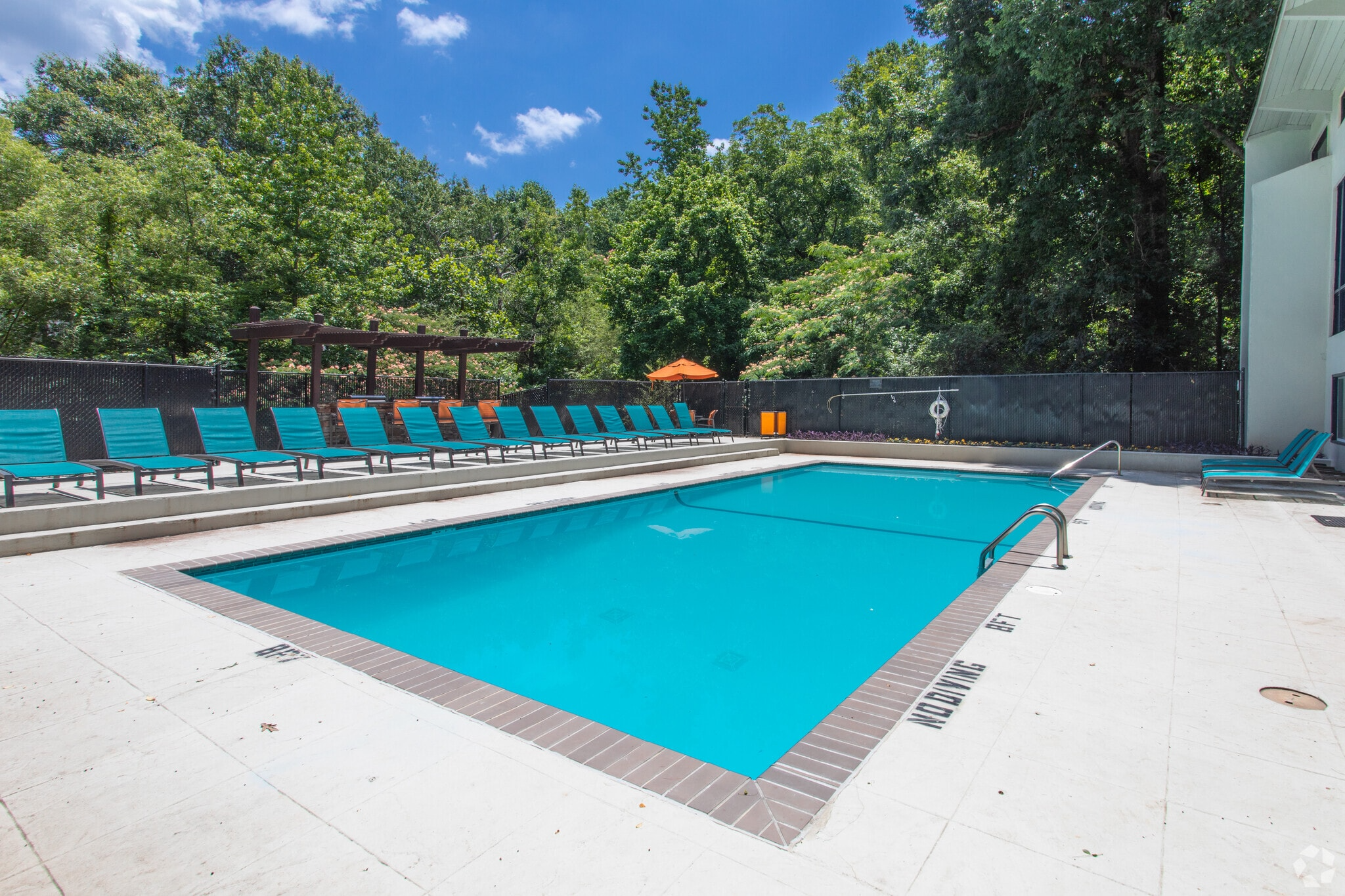 pool and BBQ space at The Oaks apartment homes in Athens, Georgia